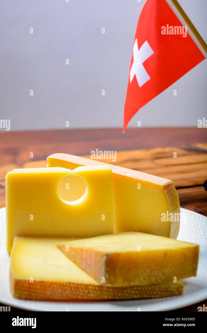 Assortment of Swiss cheeses Emmental or Emmentaler mediumhard cheese