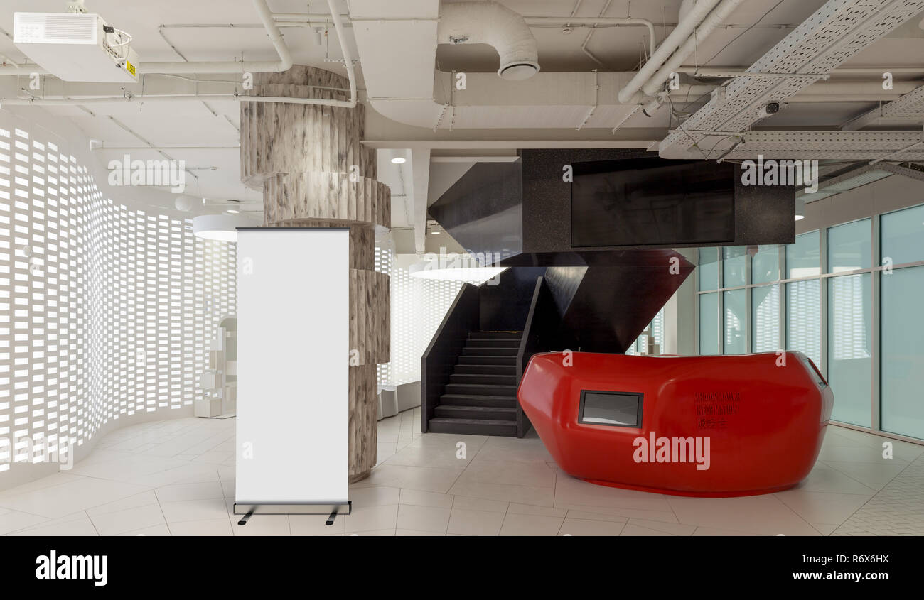 Blank Roll Up Banner Stand In Office Interior With Reception Desk