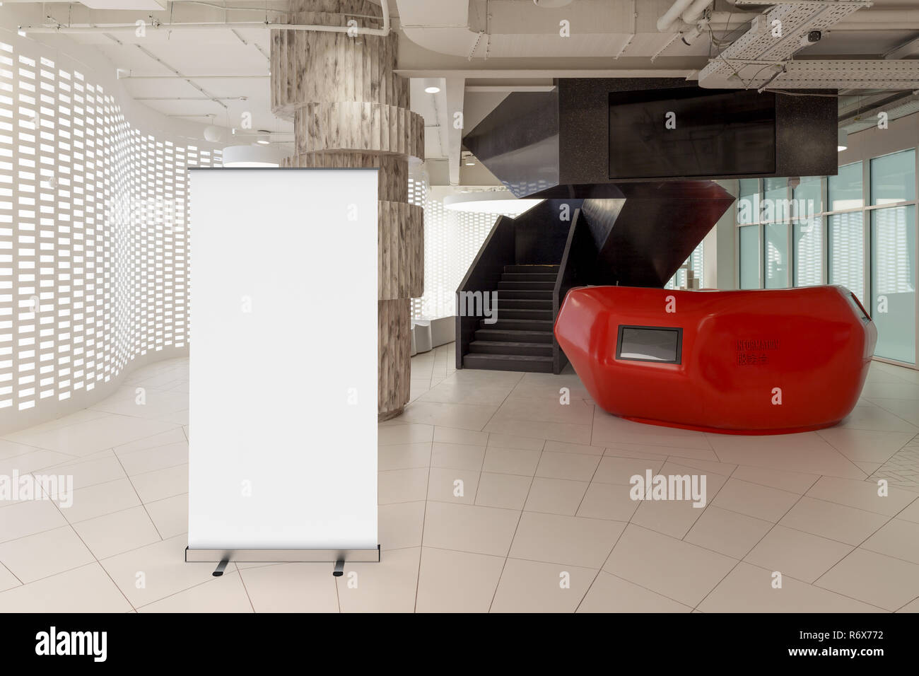 Blank Roll Up Banner Stand In Office Interior With Reception Desk