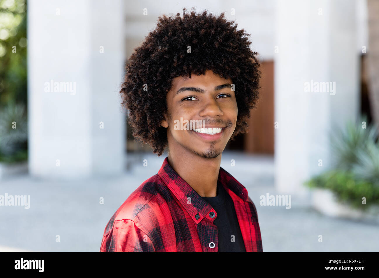 Portrit Of An African American Hipster Man With Afro Hairstyle In