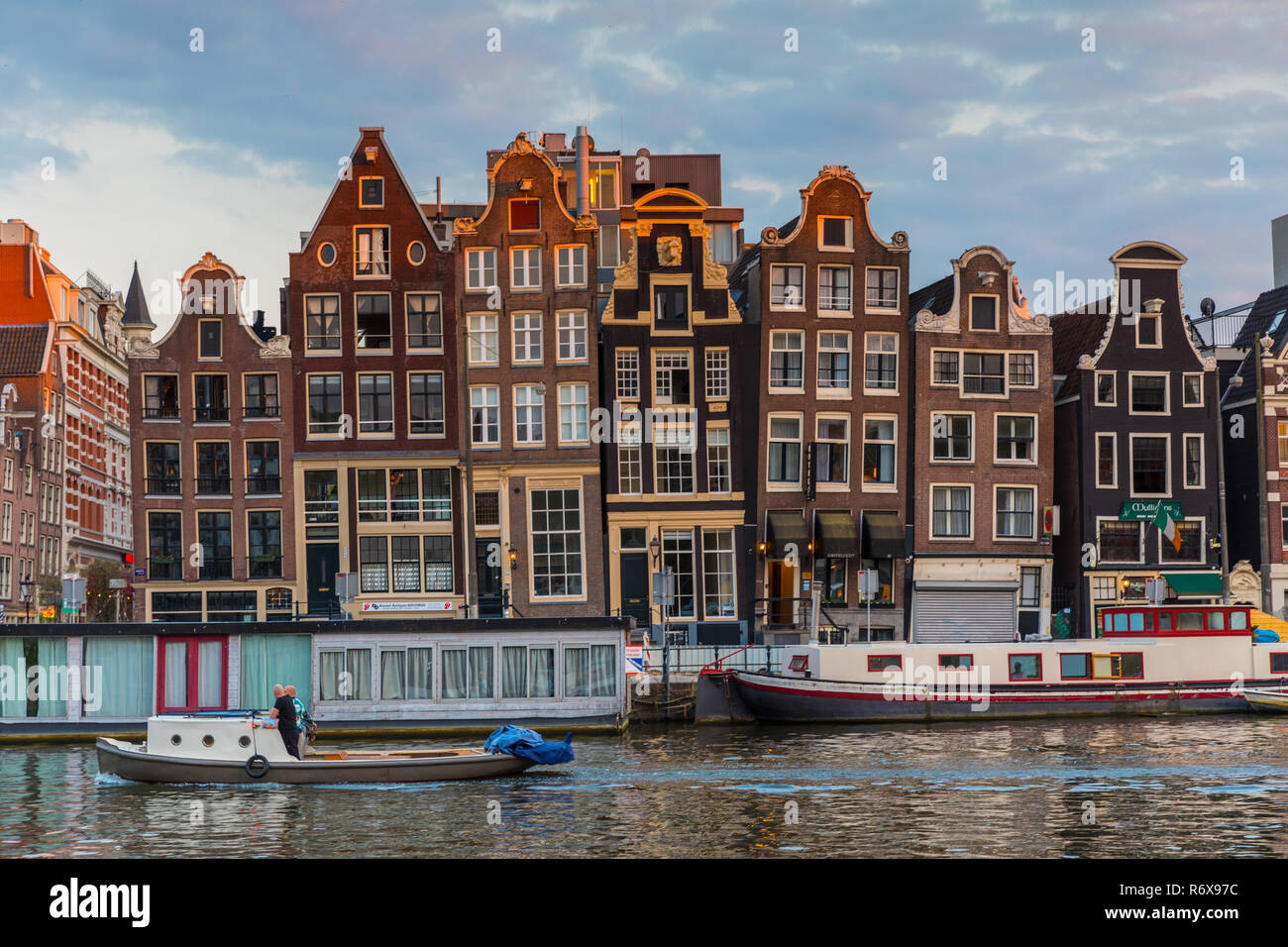 Houseboats along the beautiful canals of Amsterdam, the Netherlands, in summer Stock Photo
