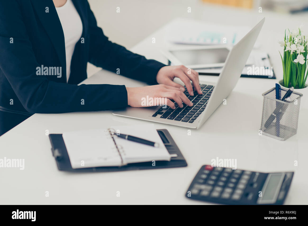 Profile side above high angle view cropped classy elegant lady hands attorney lawyer manager typing data notepad laptop at light white modern workplac Stock Photo