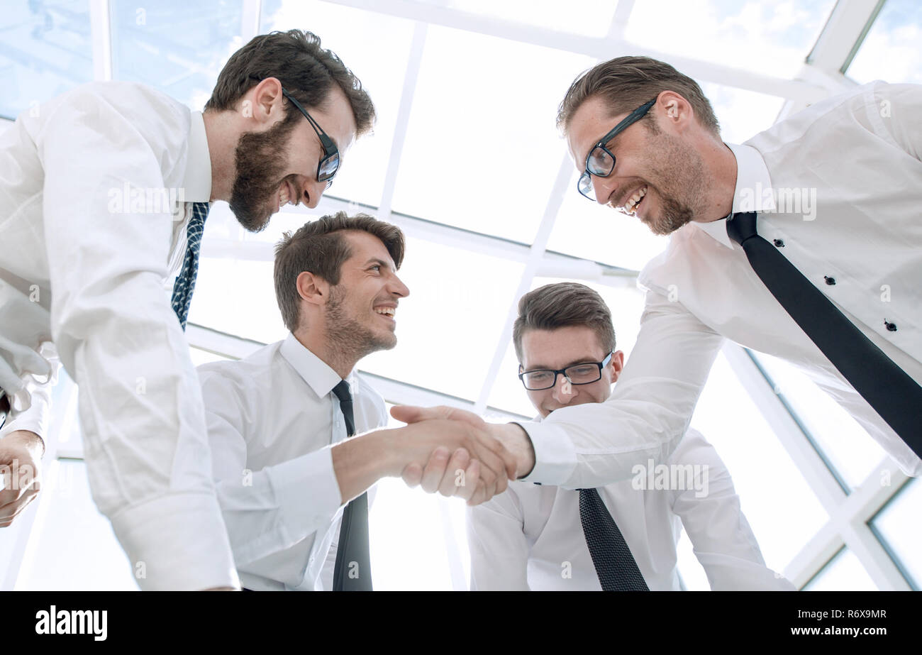 bottom view.business colleagues shaking hands. Stock Photo