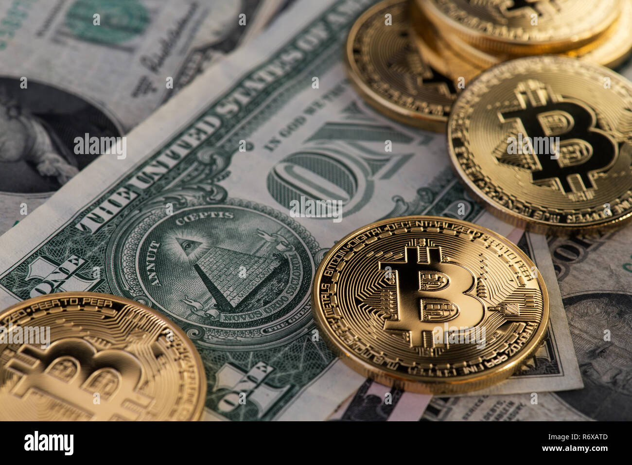 Bitcoin and banknotes of one dollar Stock Photo - Alamy