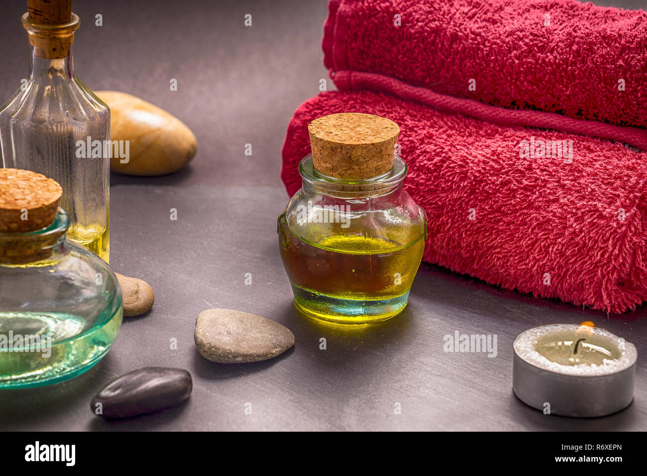 zen basalt stones and aroma oil on the stone background Stock Photo