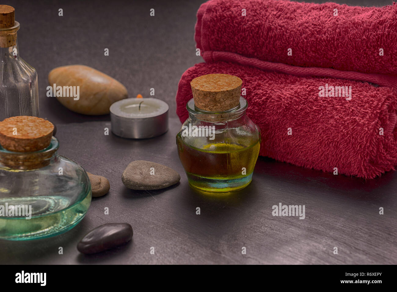 zen basalt stones and aroma oil on the stone background Stock Photo