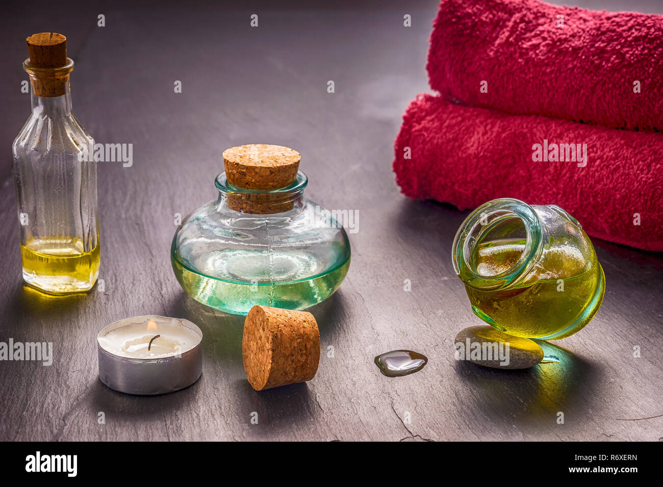 zen basalt stones and aroma oil on the stone background Stock Photo