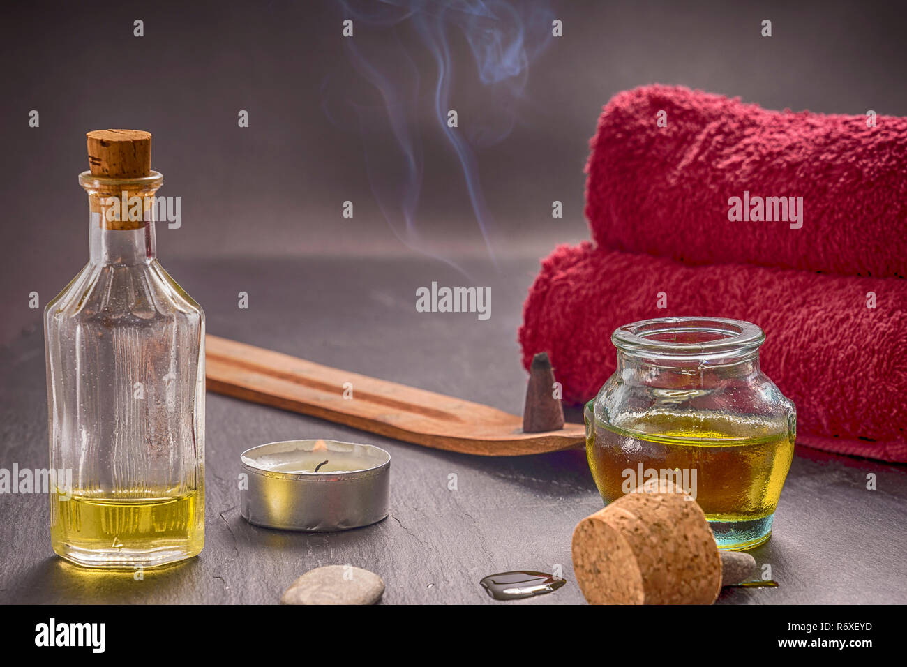 zen basalt stones and aroma oil on the stone background Stock Photo