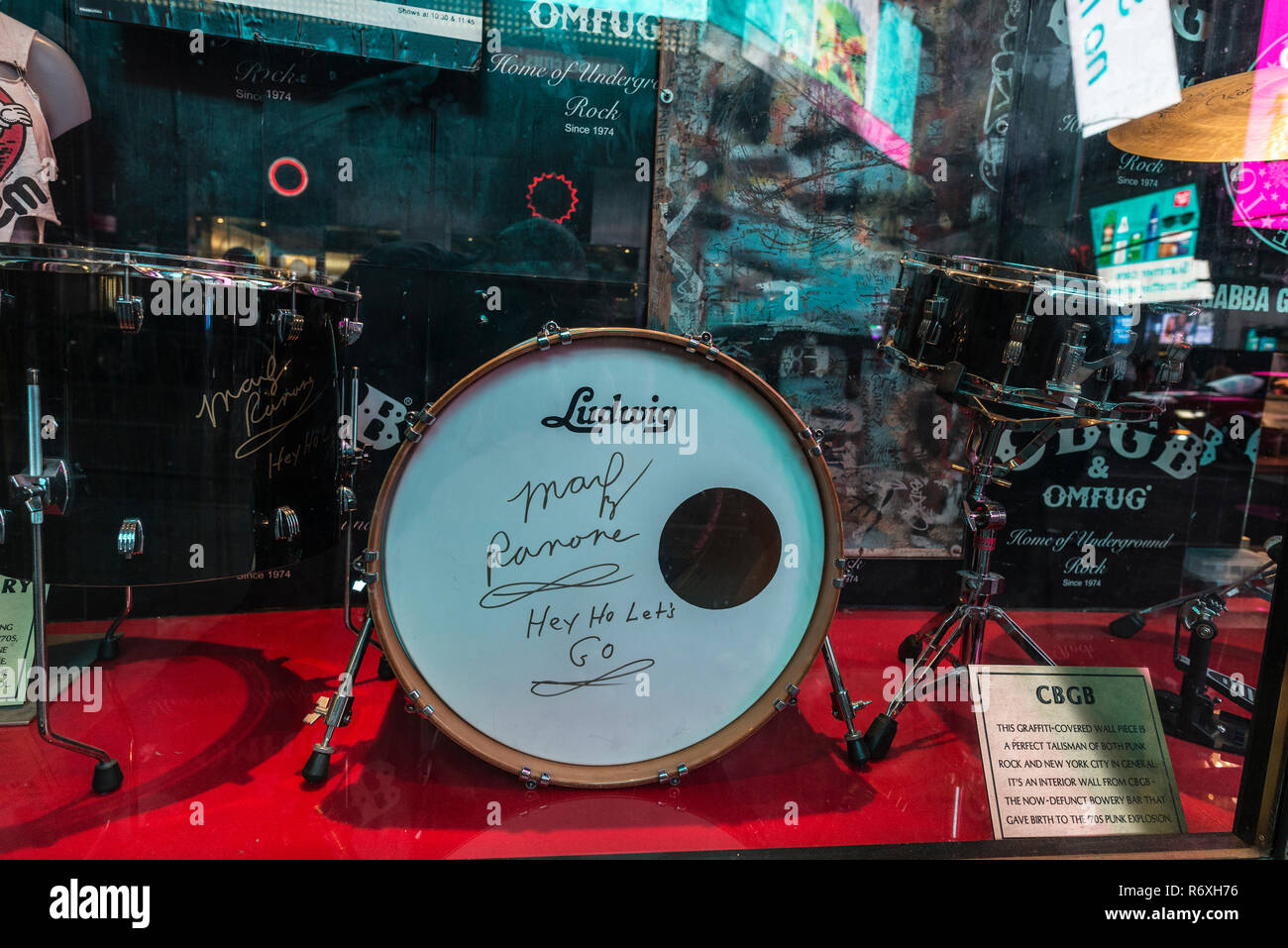New York City, USA - July 30, 2018: Bass drum signed by Marky Ramone, drummer of the punk rock band the Ramones, in Hard Rock in Times Square at night Stock Photo