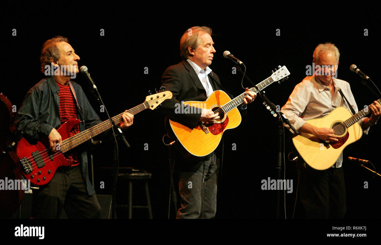 Harry Shearer (L), Michael McKean (C) and Christopher Guest perform on their Unwigged and Unplugged tour as Spinal Tap celebrates their 25th anniversary of the film 'This is Spinal Tap' at the Fillmore Miami Beach at the Jackie Gleason Theater in Miami Beach on May 5, 2009. Stock Photo