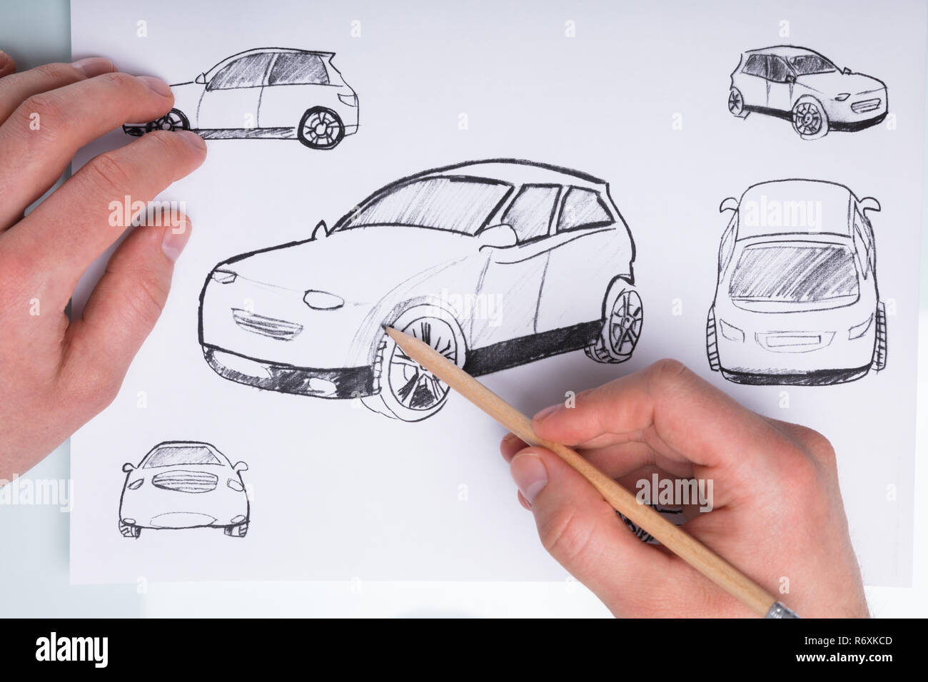 Human Hand Drawing Sketch Of A Car Stock Photo
