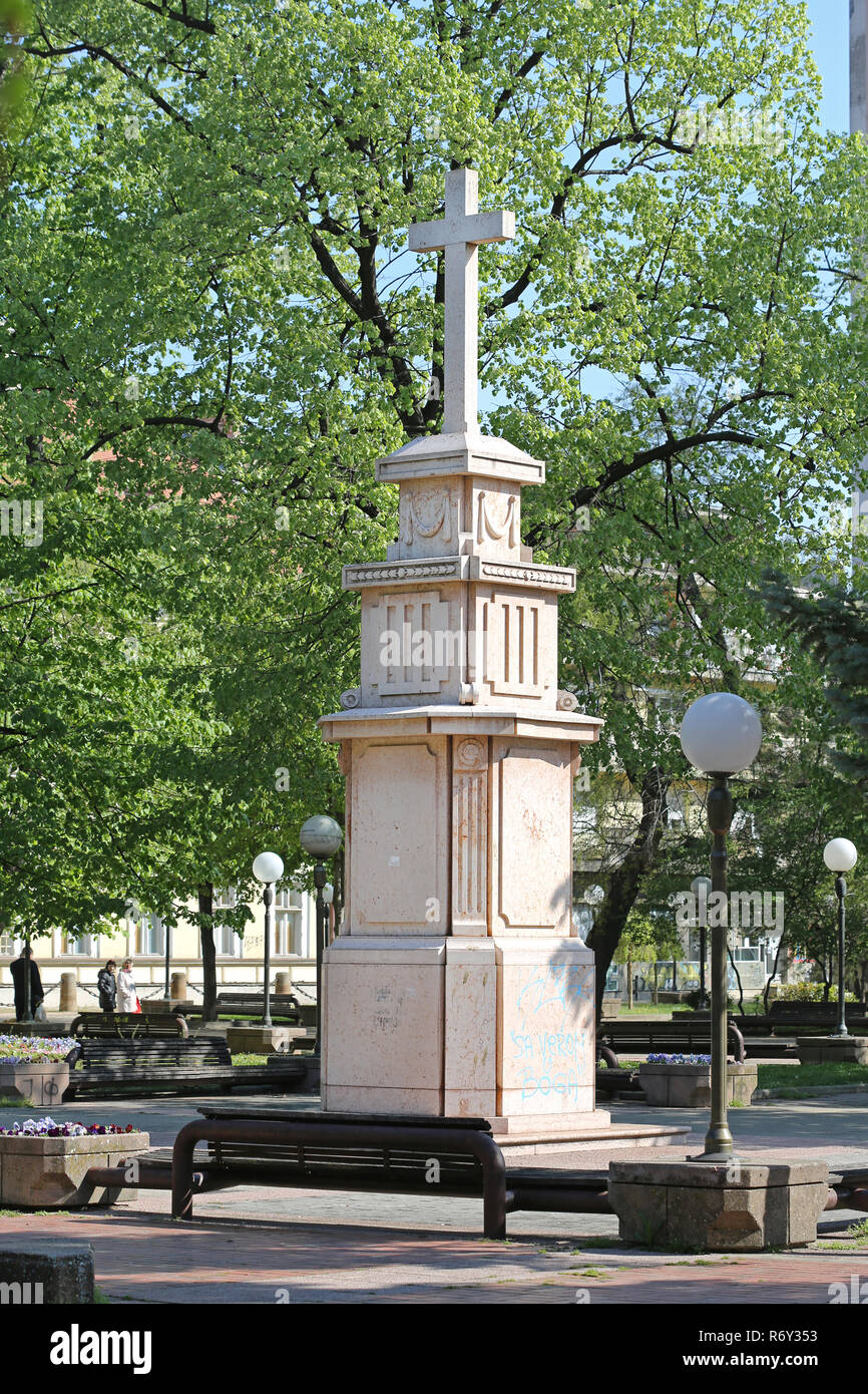 PANCEVO, SERBIA - APRIL 19, 2015: Memorial Cross at Town Park in Pancevo, Serbia. Stock Photo