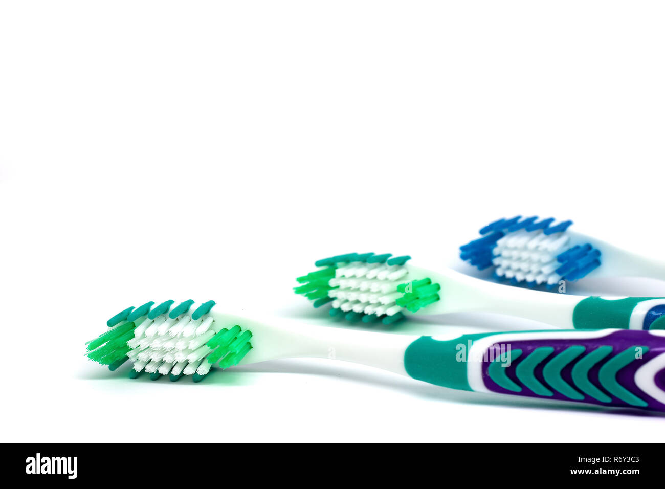 Bright toothbrushes isolated on white background Stock Photo - Alamy