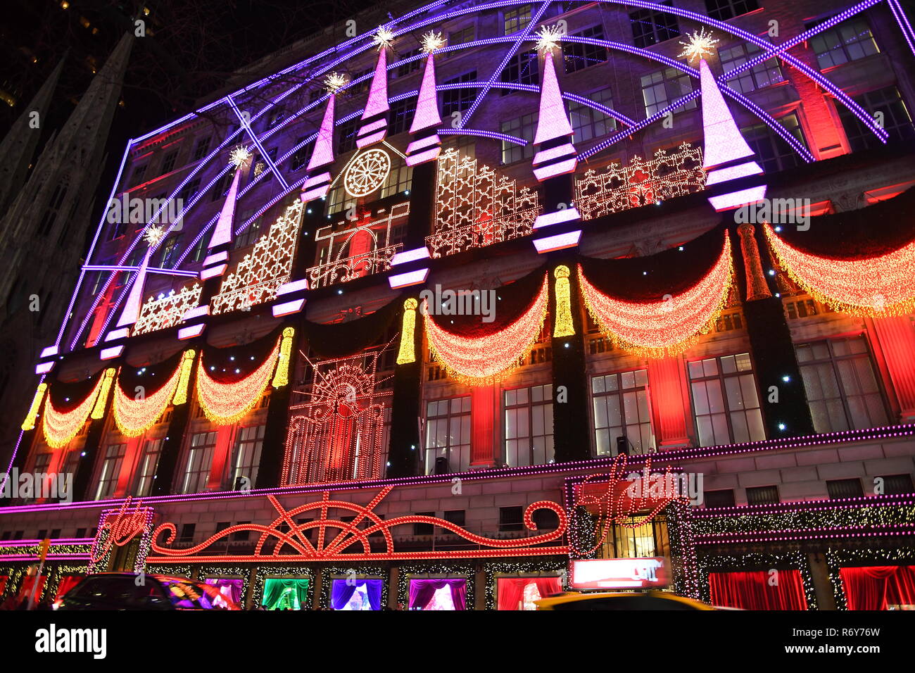 NEW YORK - DECEMBER 4, 2018: Saks Fifth Avenue’s magical Theater of Dreams themed 2018  ultimate light show and holiday windows displays on December 4 Stock Photo