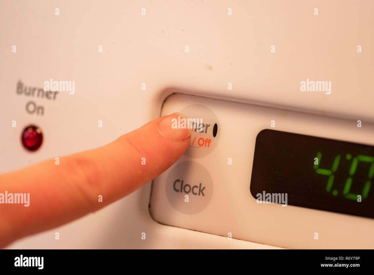 Finger To Timer Button Stock Photo Alamy