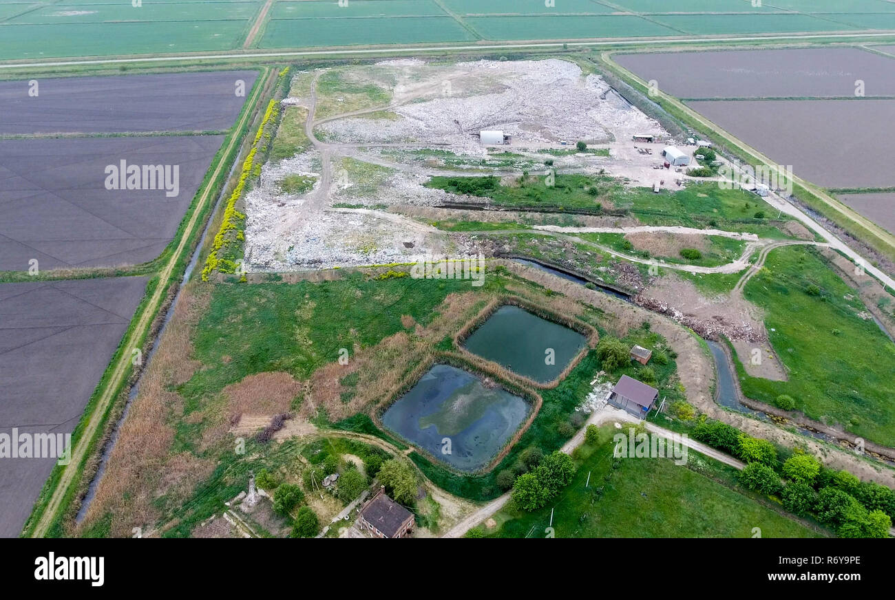garbage dump with heaps of garbage and treatment facilities. Landfill ...