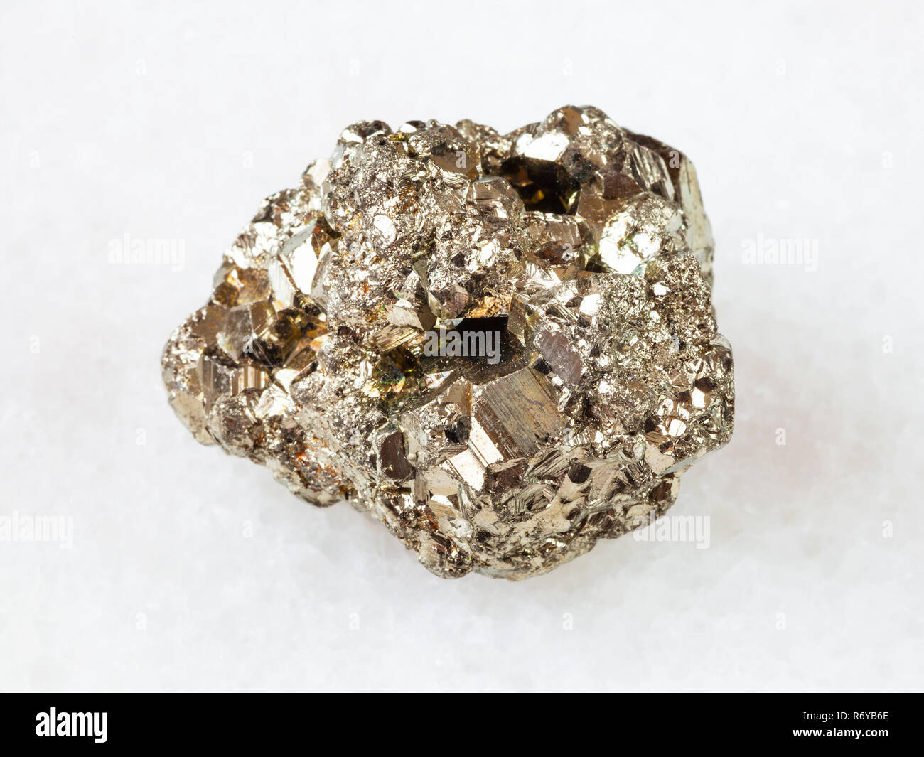 Pyrite Small Rough Texture rough iron pyrite stone on white Stock Photo - Alamy