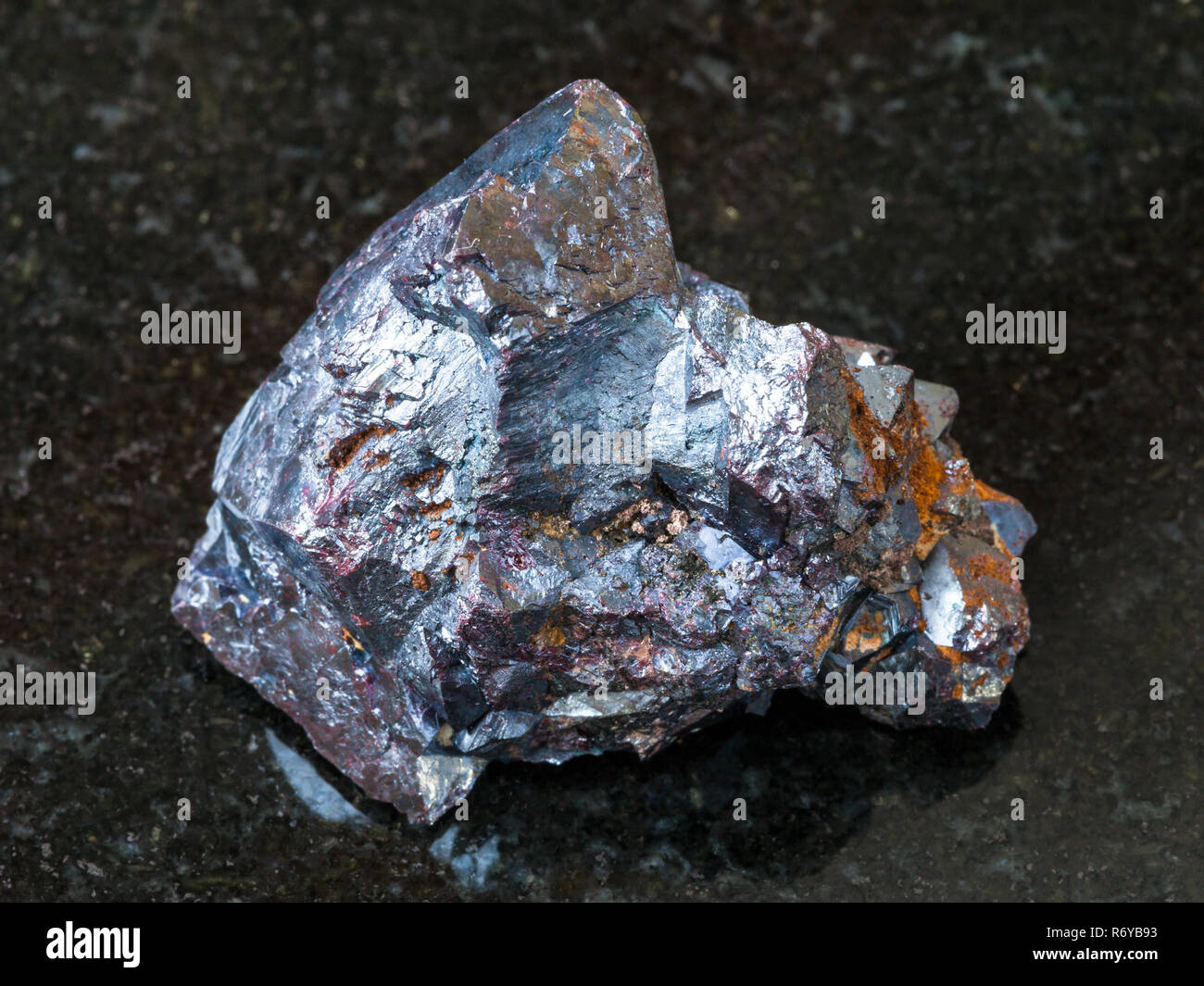 raw Cuprite stone on black granite Stock Photo - Alamy