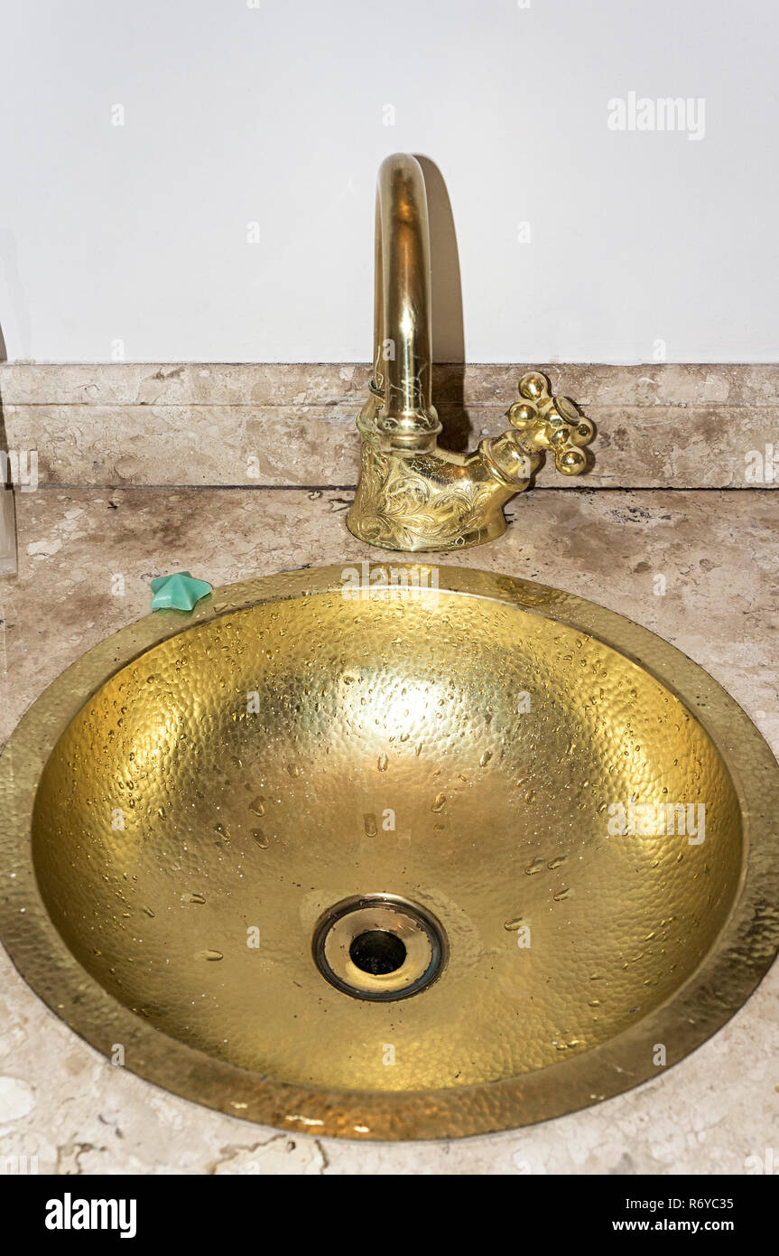 golden brass sink bathroom vintage nobody marble Stock Photo - Alamy
