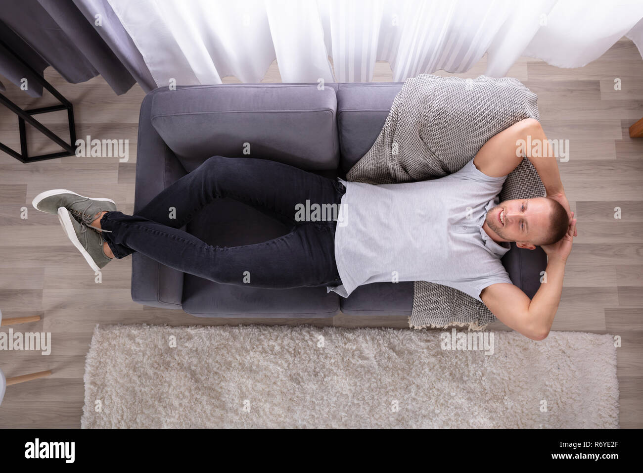 Young man resting hi-res stock photography and images - Alamy