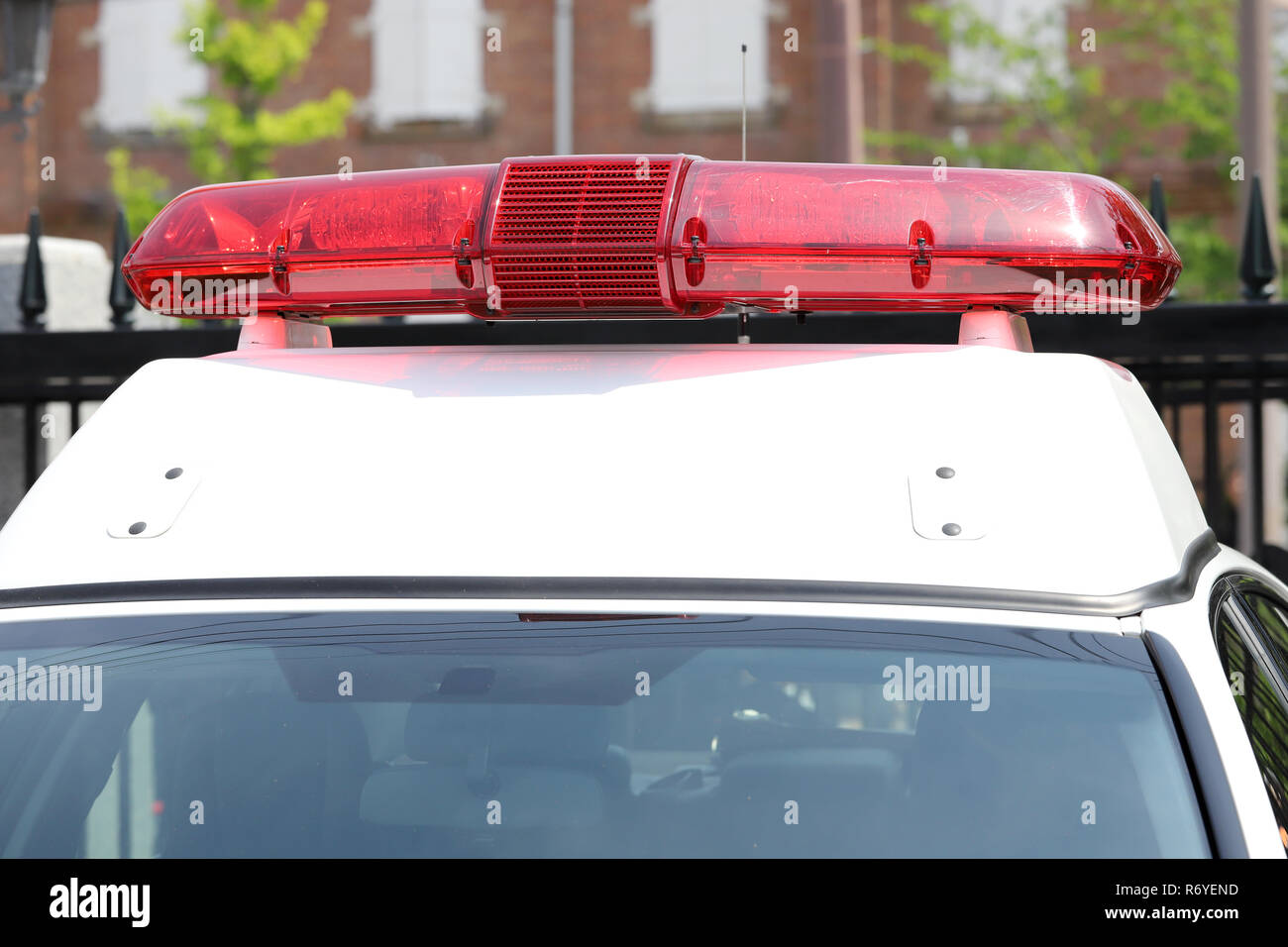 Japanesep police red light mounted on the roof of police car Stock Photo