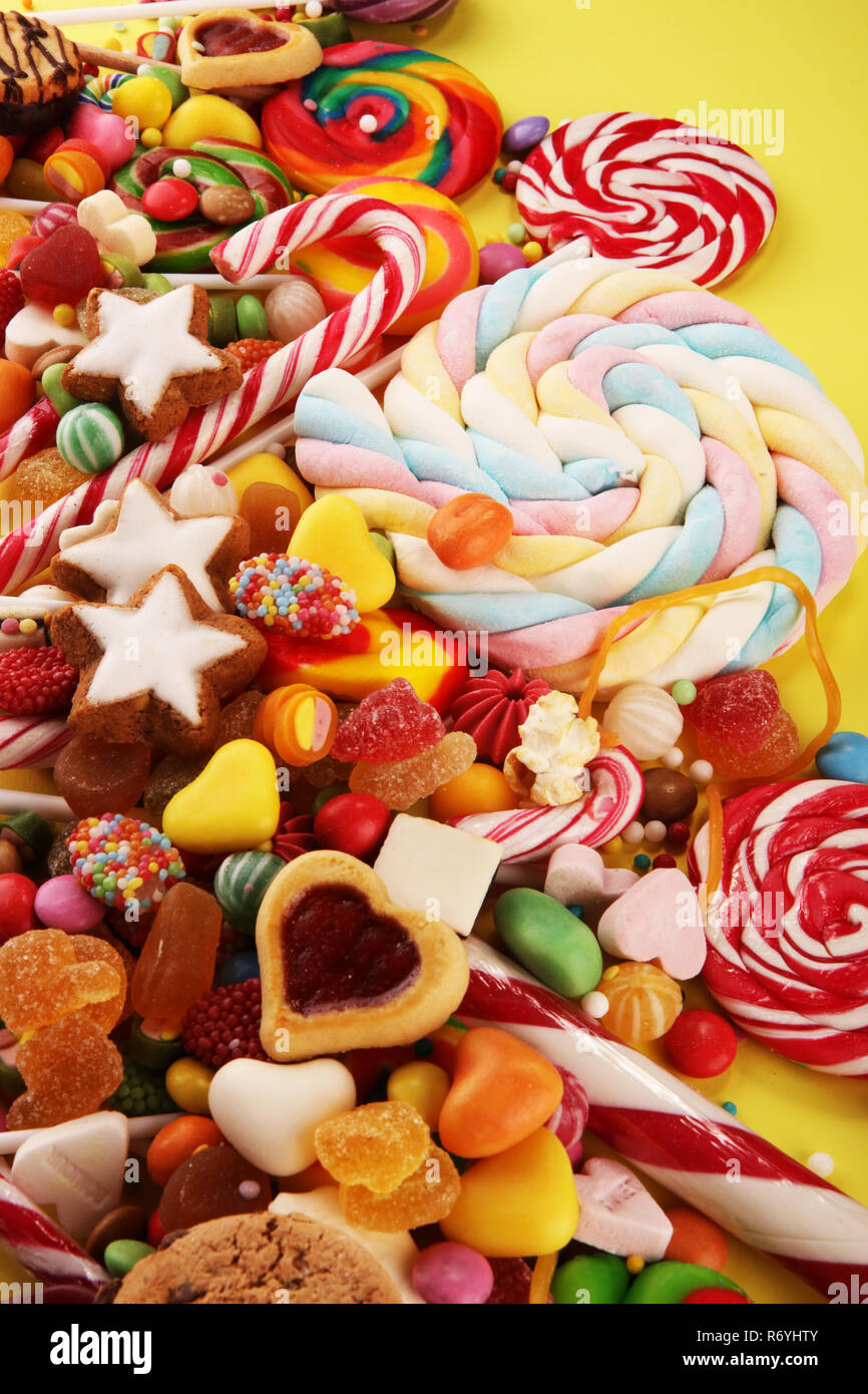 candies with jelly and sugar. colorful array of different childs sweets ...