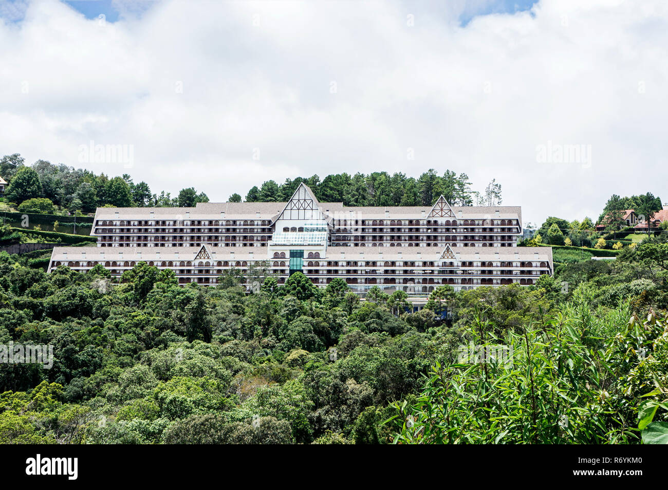 huge building swiss colonial architecture outdoors nature vegetation