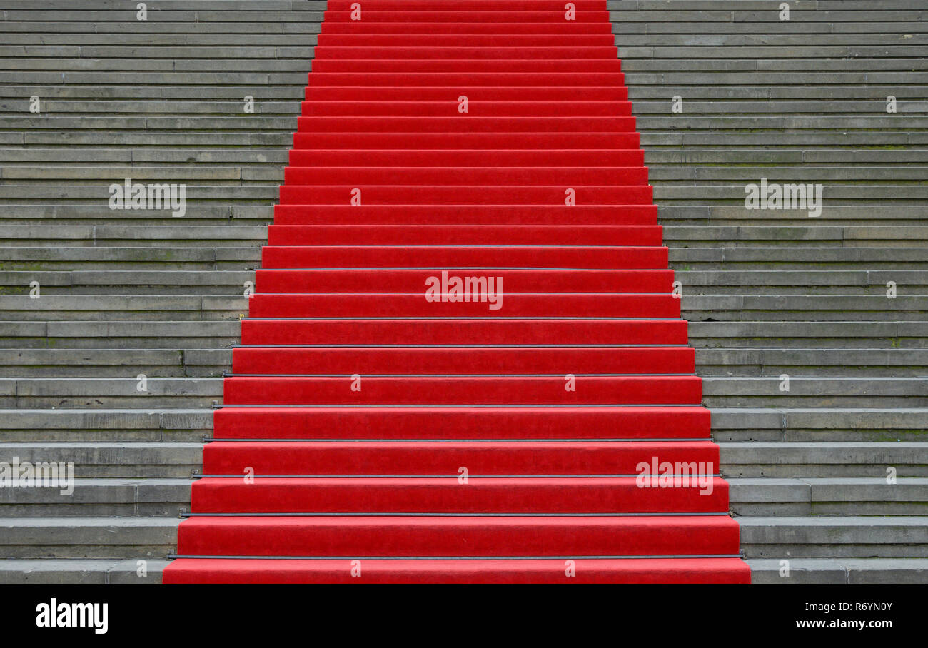 Red carpet over concrete stairs perspective Stock Photo