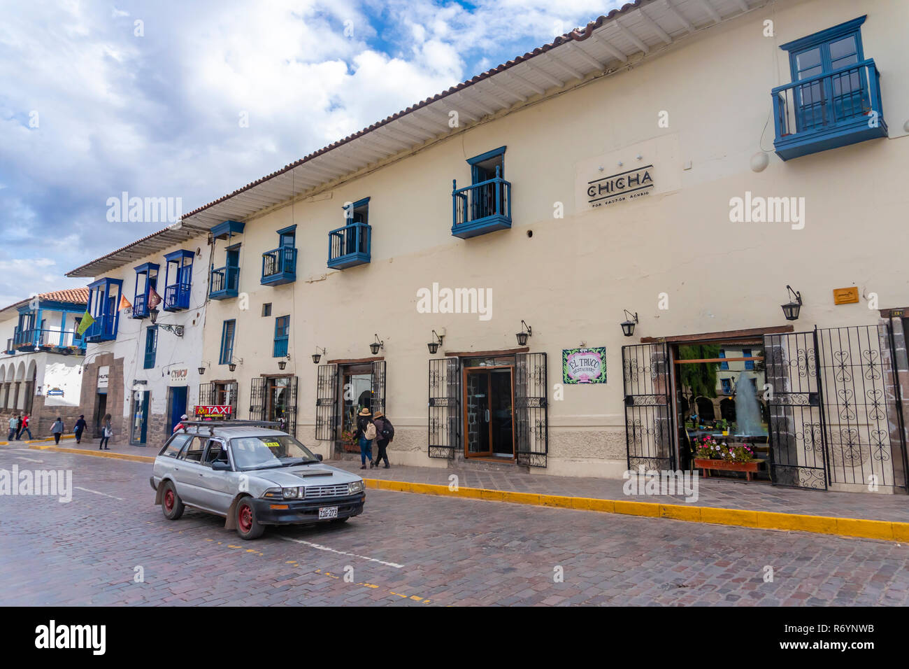 Taxi on a road in Cusco, Peru Stock Photo