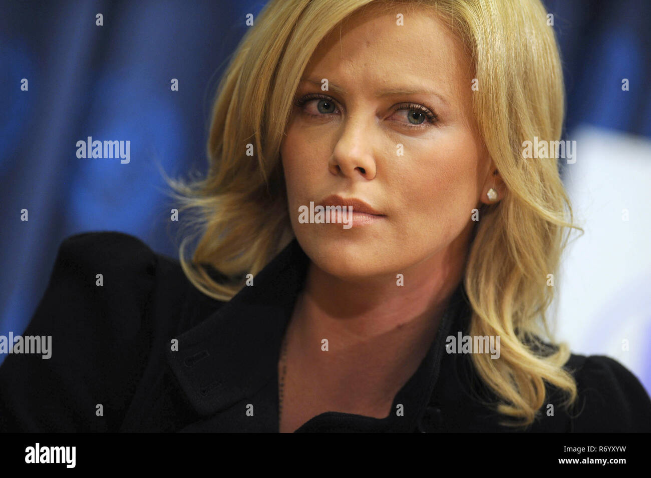 Charlize Theron speaks at a panel discussion following the UN Messenger of Peace induction ceremony at The United Nations. New York City. November 17, 2008 Credit: Dennis Van Tine/MediaPunch Stock Photo