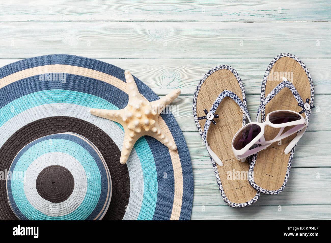 Travel vacation background concept with beach hat, sunglasses, flip ...