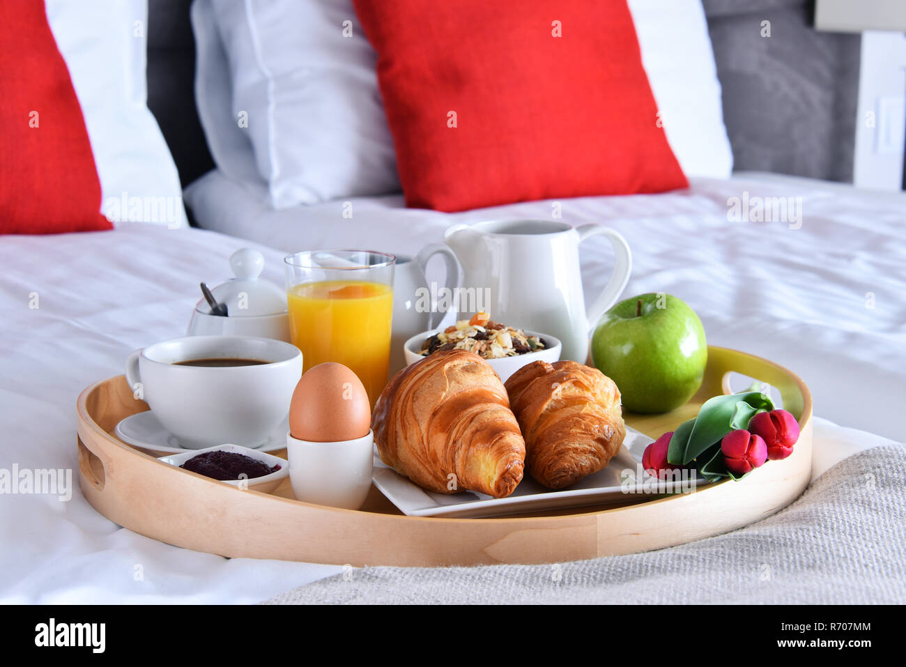 Breakfast on tray in bed in hotel room Stock Photo - Alamy