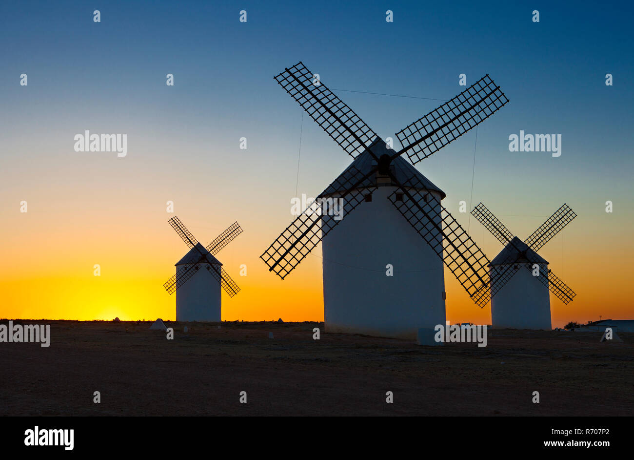 Traditional windmills at rising, Campo de Criptana, La Mancha, Spain Stock Photo