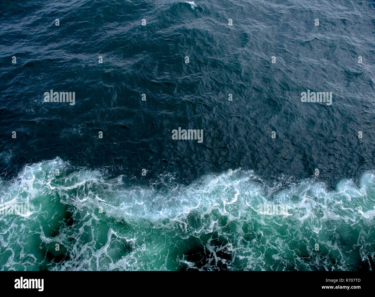 Aerial view. Ocean waves and foam on water surface Stock Photo - Alamy