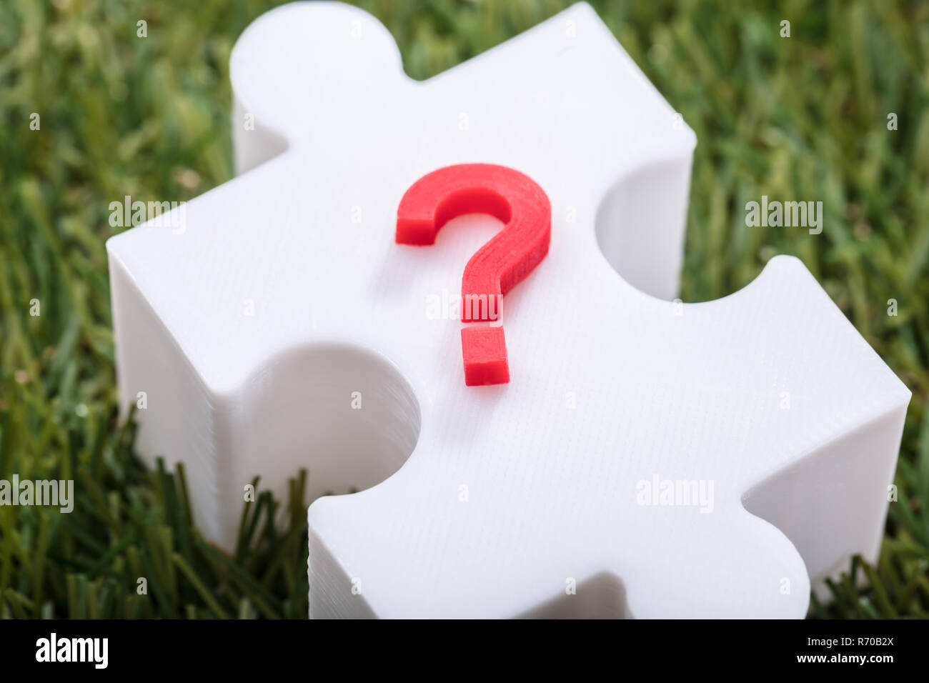 Red Question Mark Sign On Jigsaw Puzzle Stock Photo
