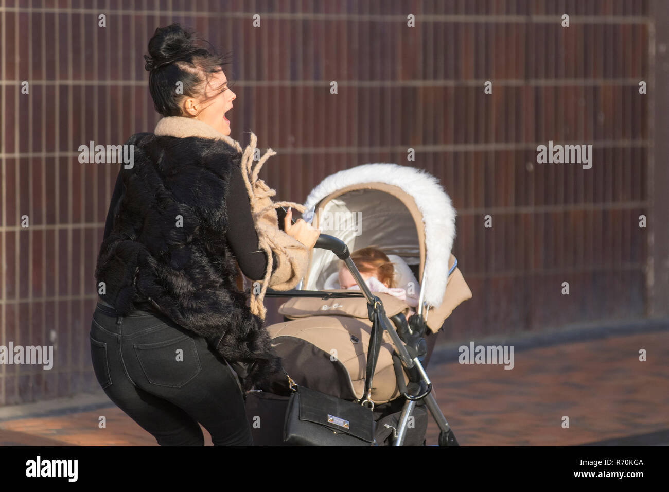 Women wheeling prams hi-res stock photography and images - Alamy