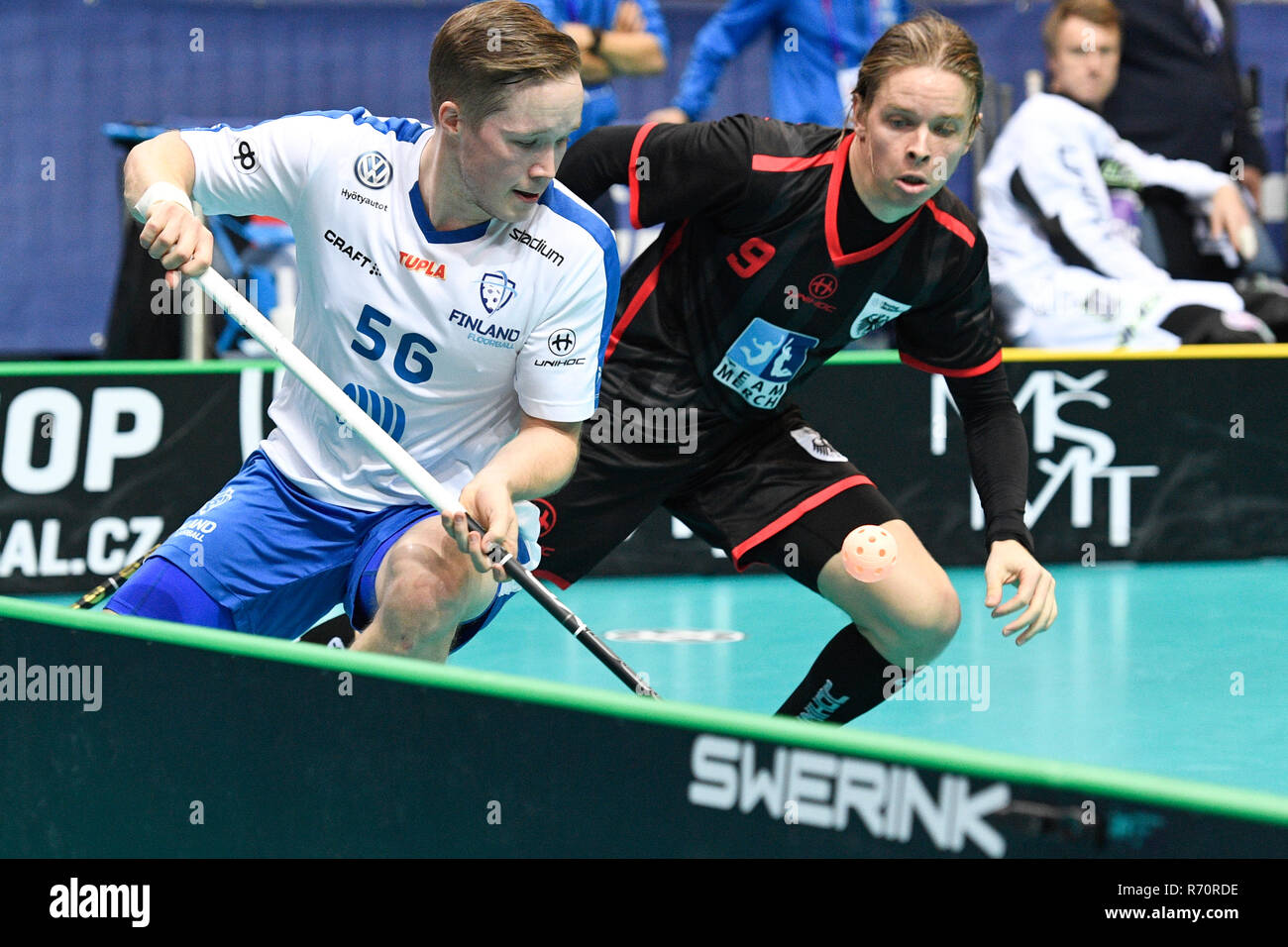 Prague, Czech Republic. 07th Dec, 2018. L-R Krister Savonen (FIN) and Benjamin Borth (GER) in action during the Men's World Floorball Championships quarterfinal match Finland vs Germany, played in Prague, Czech Republic, on December 7, 2018. Credit: Michal Kamaryt/CTK Photo/Alamy Live News Stock Photo