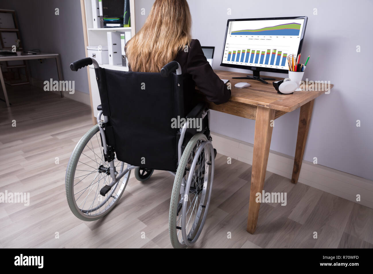 Disabled Businesswoman Working On Computer Stock Photo Alamy