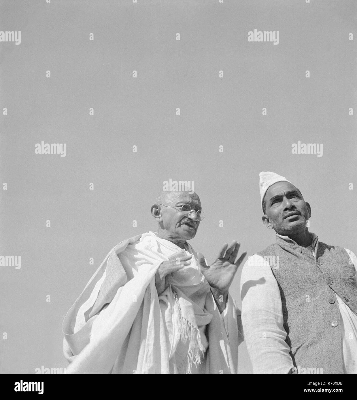 Mahatma Gandhi with worker at Madras, Chennai, Tamil Nadu, India, 1946, old vintage 1900s picture Stock Photo