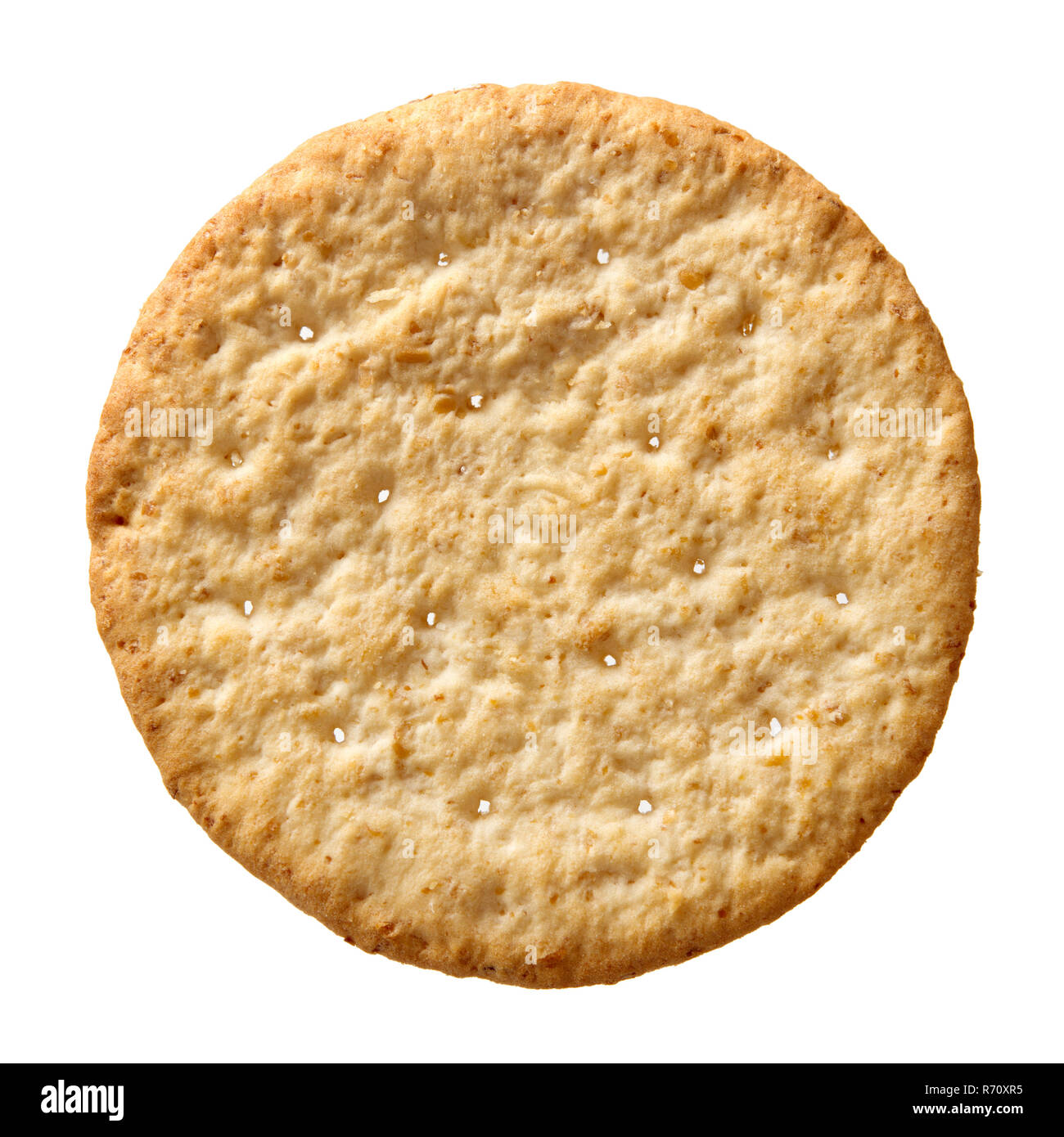 Top view wheat cracker. A single piece whole meal oat biscuit isolated on white background. Stock Photo