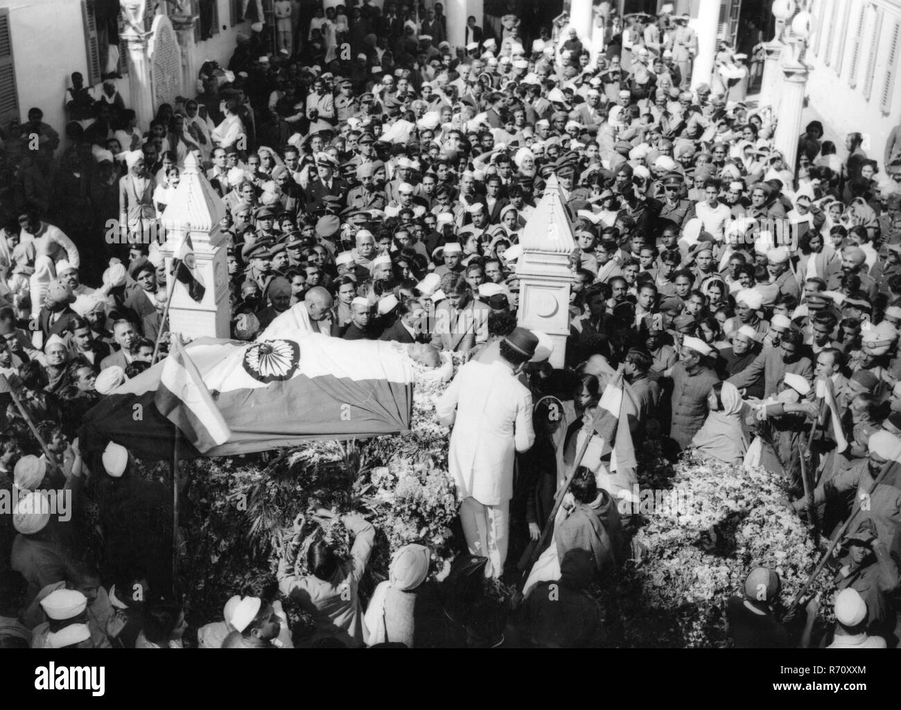 Mahatma Gandhi dead body leaving Birla House for cremation procession to Rajghat, New Delhi, India, January 31, 1948, old vintage 1900s picture Stock Photo