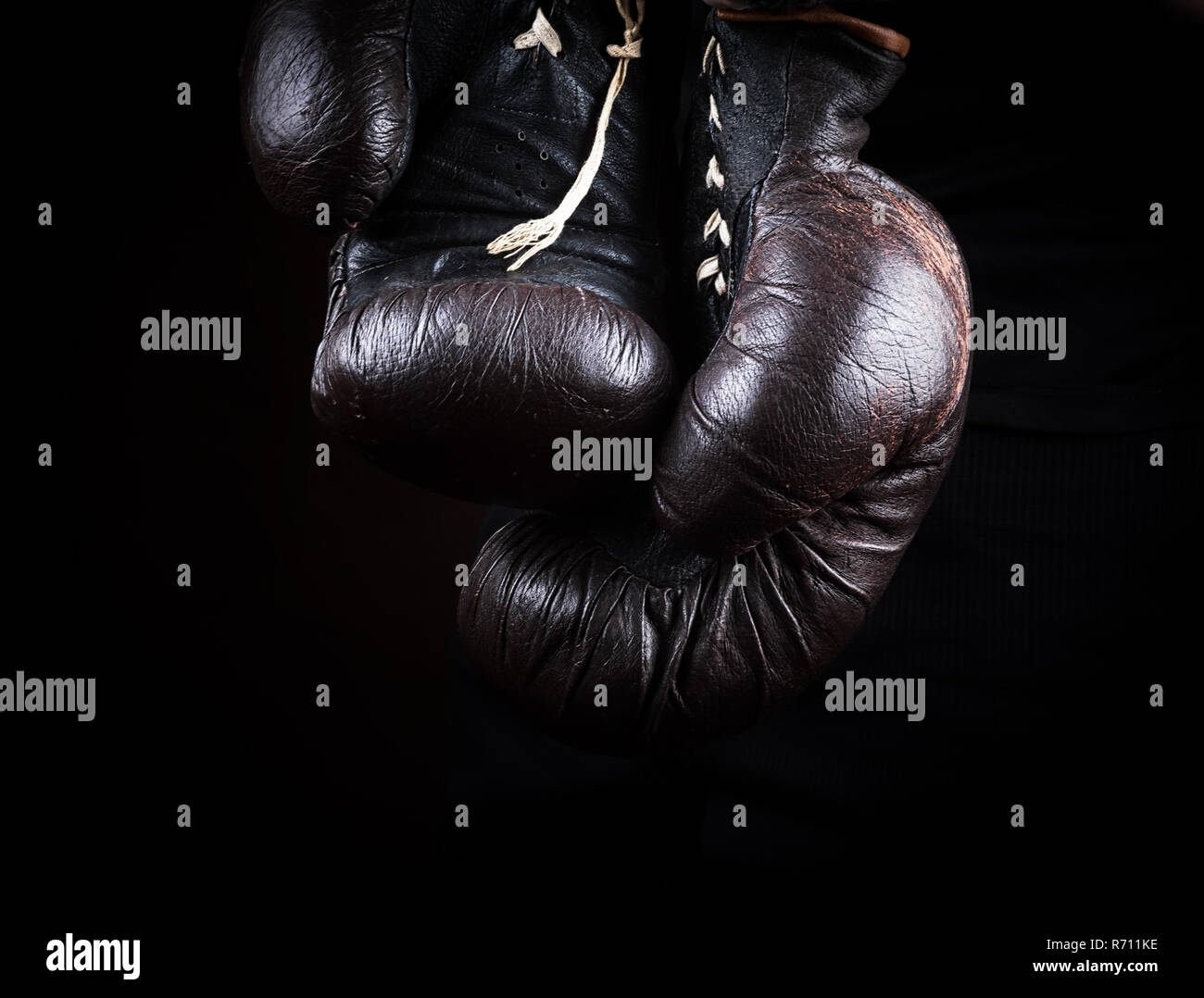Hanging Boxing Gloves Black Background