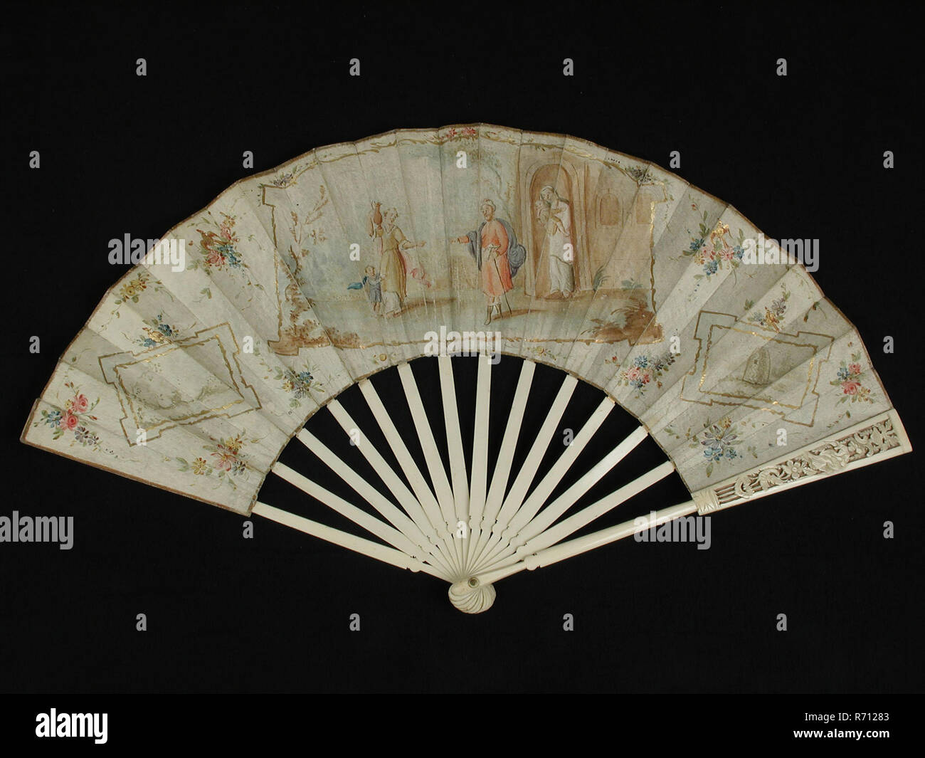 Folding fan with bone frame and multicolored painted front and back cover with biblical representation, Jacob and Hagar, church fan folding fan range clothing accessory women's clothing clothes leg parchment paper leather wood copper ivory paint, rash 145 ° fan blade 13.5 textile painted incision cut out Folding fan with frame of non-contiguous legs cut and cut out legs outside legs. Twenty undecorated inner legs. Range leaf of parchment with painting of religious representation Glued confirmation à l'anglaise. Locking pin and washer church church service woman bible religion Jacob Hagar rococ Stock Photo