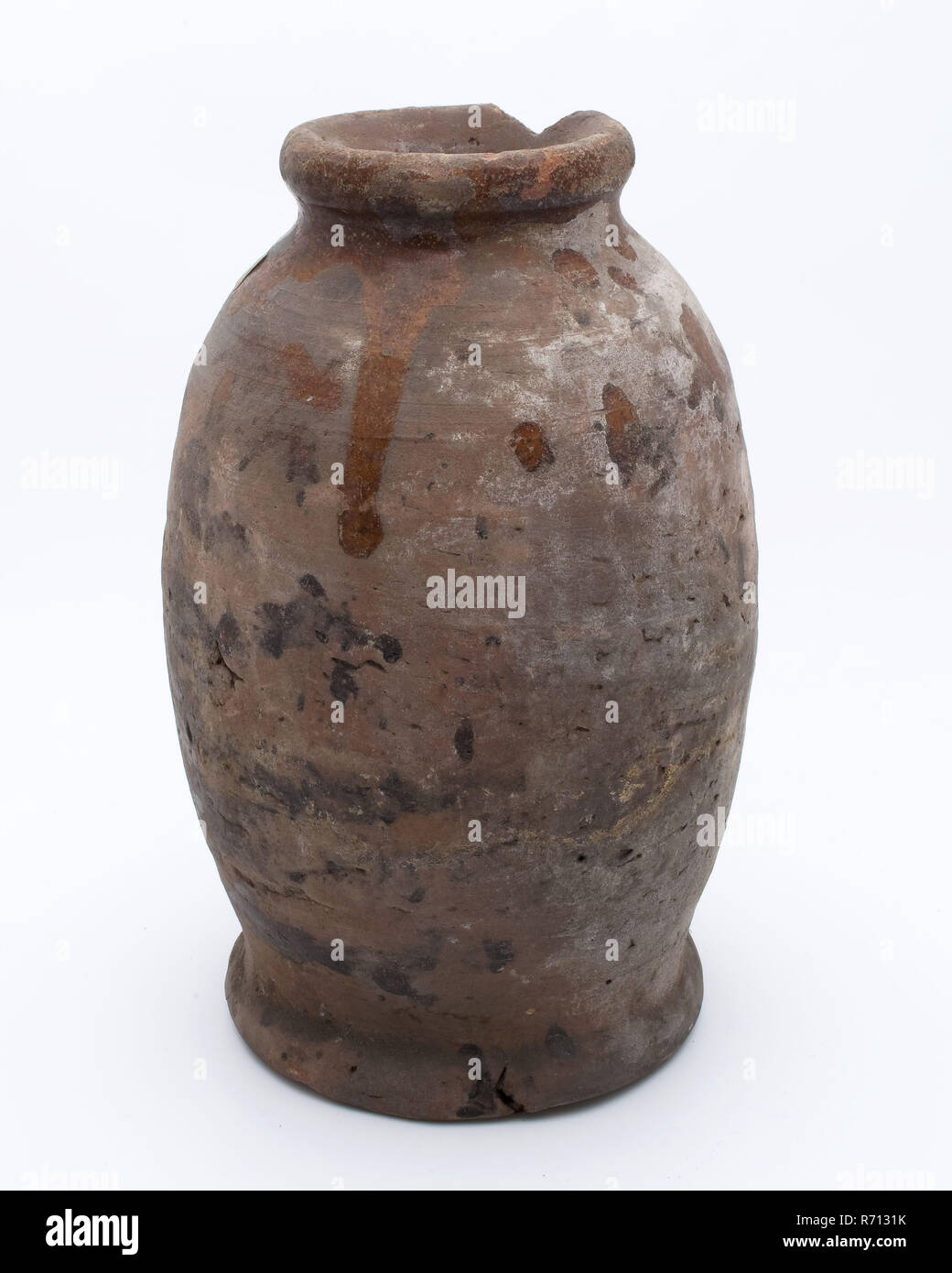 Brown stoneware jug be carved with decorative carvings and embossing with  floral decoration, jug crockery holder soil find ceramic stoneware clay  engobe glaze salt glaze, hand turned stamped glazed baked carved Stoneware
