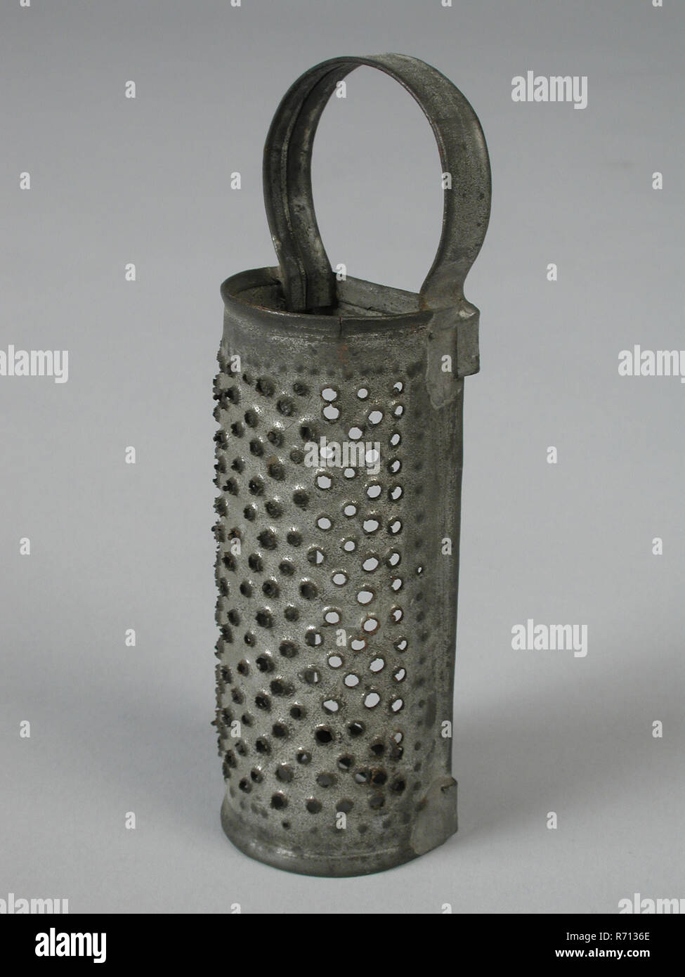 metal worker: Gresnich, Cans miniature grater, rasp kitchenware miniature  toy relaxant model metal, curved soldered tinned tin Elongated round bent  perforated half cylinder with rough holes Bottom at two places transversely  connected.