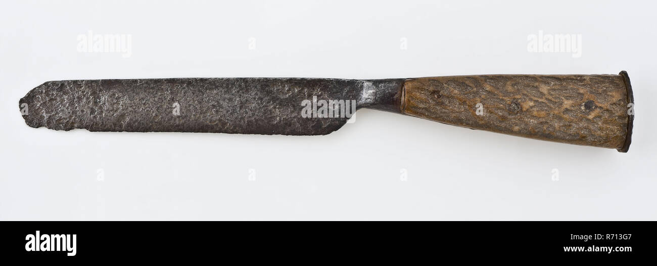 Knife with fairly wide blade and tapered handle with two legs, knife