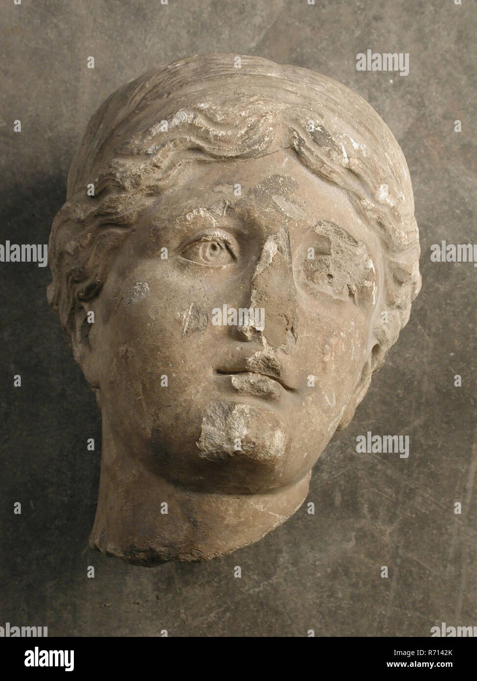 Female head, fragment, sculpture sculpture fragment sandstone stone