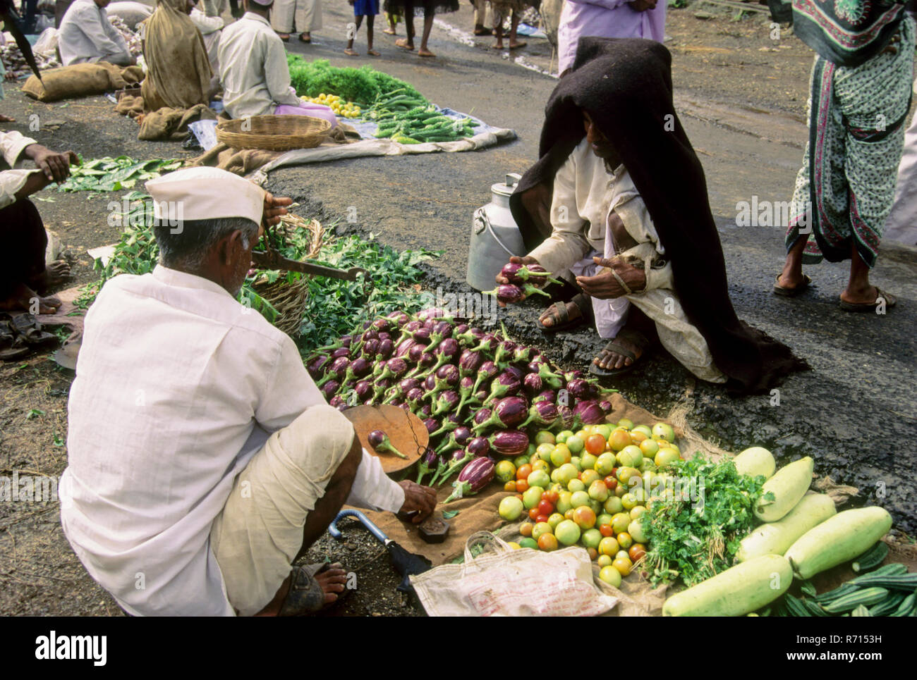 vegetable seller in Weekly Bazaar at bhandardara, dist ahmednagar, maharashtra, india Stock Photo