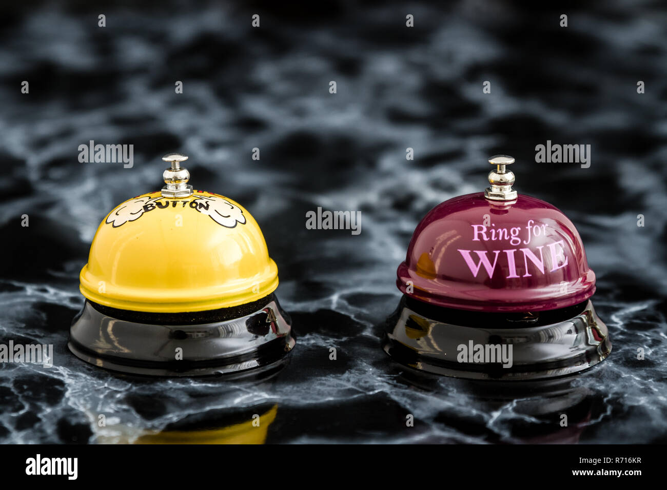 Reservation Bells on Black Marble Background Stock Photo