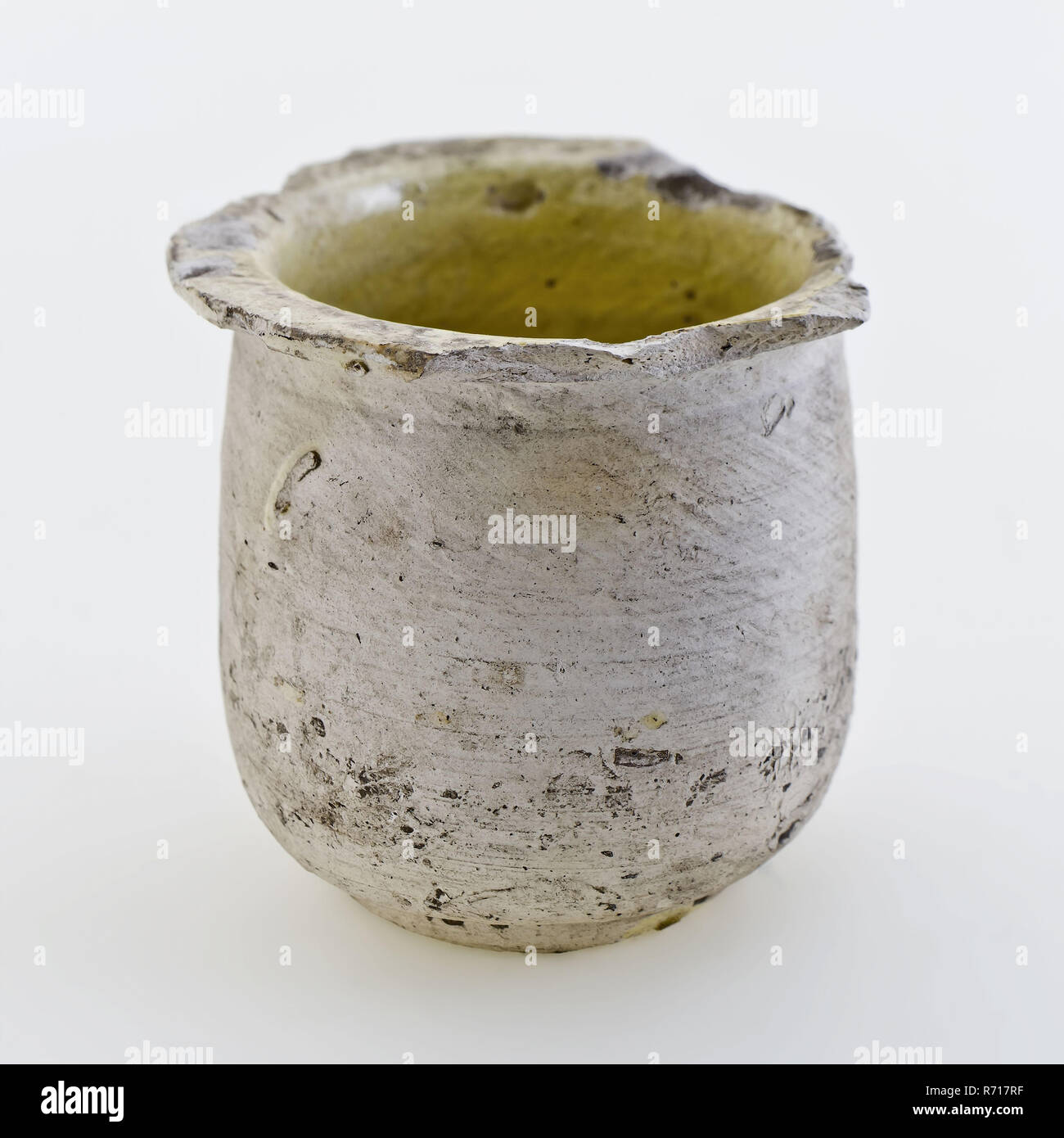 Pottery ointment jar, white shard, internally glazed yellow, ointment